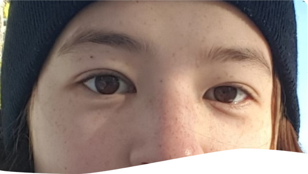 Headshot of researcher in a snowy forested area