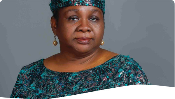 A passport sized photo of me in a green attire uploaded .