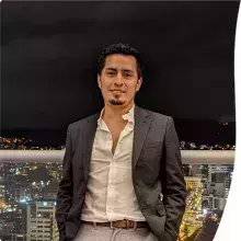 Boris in the foreground with Quito at night in the background.